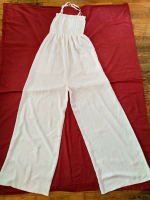 One-piece jumpsuit with straps used, size medium, cotton