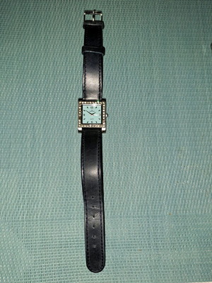 Rexstar women's watch used with leather strap and water resistant