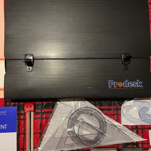 Professional drawing set used with tools and papers