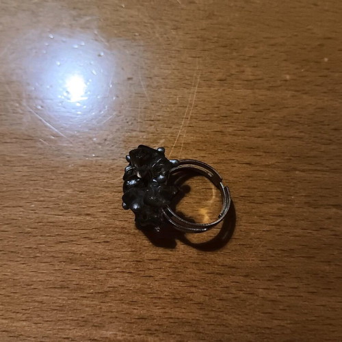 Faux ring with intricate design and adjustable size, new, silver