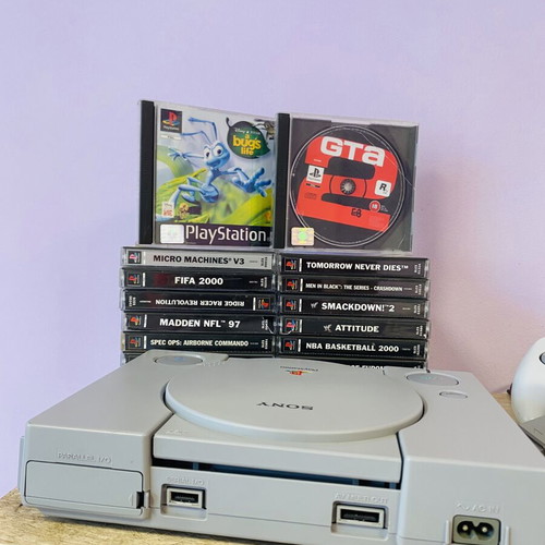 PlayStation 1 PS1 console like new with 18 original games