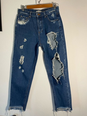 Dark denim Pull & Bear jeans used, size EU 36, with rips