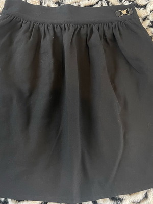 Black A-line mini skirt like new with elastic waist