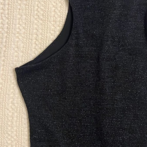 Black mini dress with feathers like new, sleeveless, tight fit