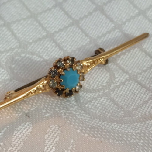 Vintage brooch with zircon and turquoise bead, used