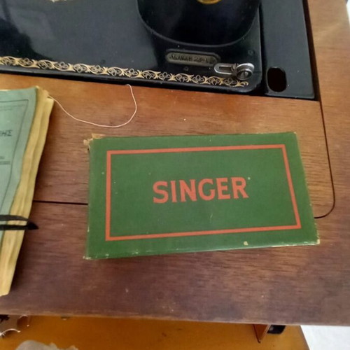 Singer sewing machine used with table