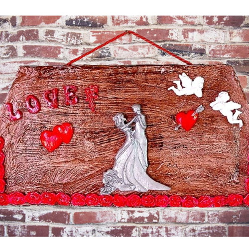 Handmade frame or tabletop decor loving couple dancing, new