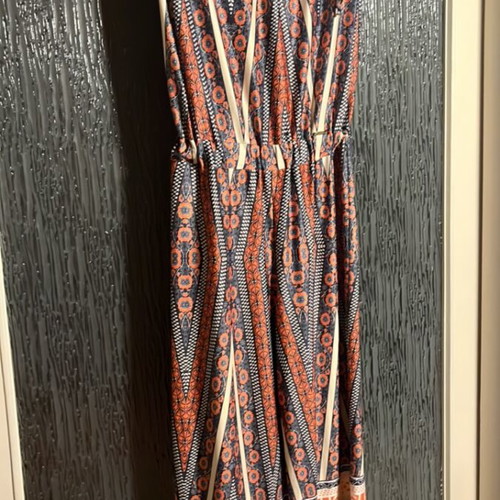 Women's jumpsuit like new, size L, colorful with ruffles