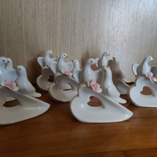 Porcelain decorative doves new, set of 7 pieces