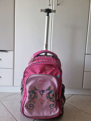 Polo school backpack used, missing one wheel