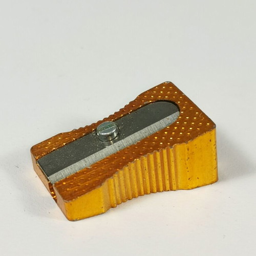 Vintage metal pencil sharpener used, orange gold, Made in Germany