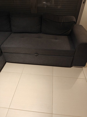 Corner sofa like new with storage and bed function