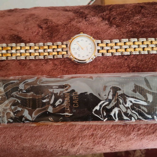 Getezin wristwatch like new, gold and silver