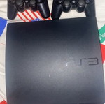 PlayStation 3 console with 4 Sony controllers