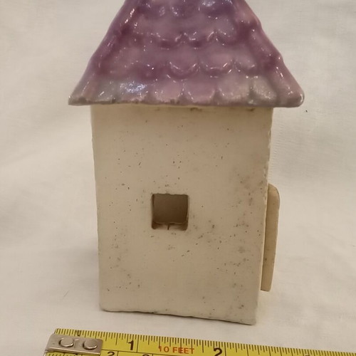 Handmade ceramic candle holder "ROZOS" used
