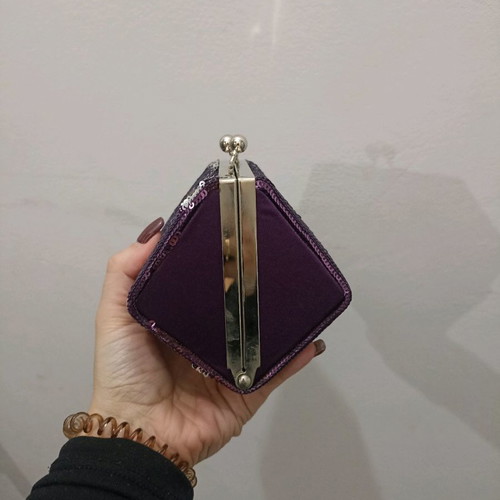 Clutch bag polygonal like new with purple sequins
