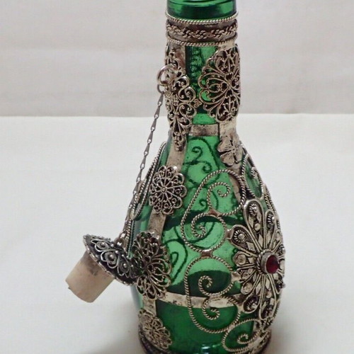 Vintage glass bottle with metal filigree technique from Ioannina folk art workshop