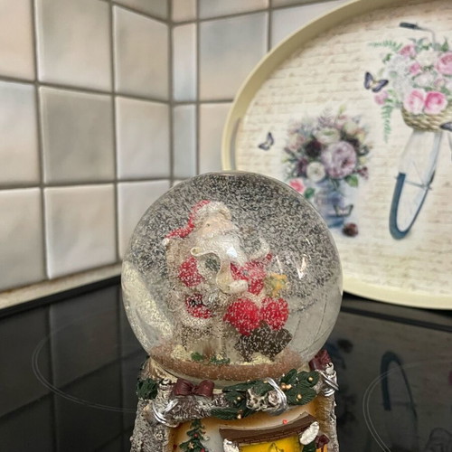 Christmas snow globe with Santa like new