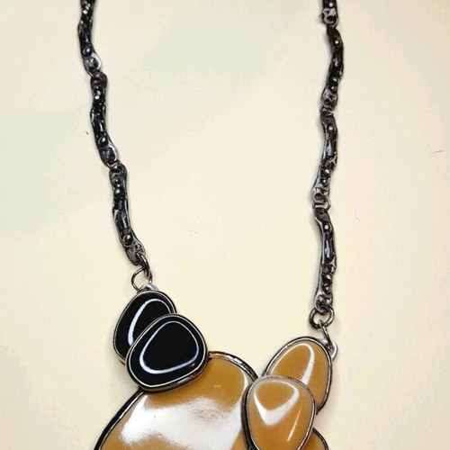 Statement necklace Dino Dinel new with articulated Pebbles motif