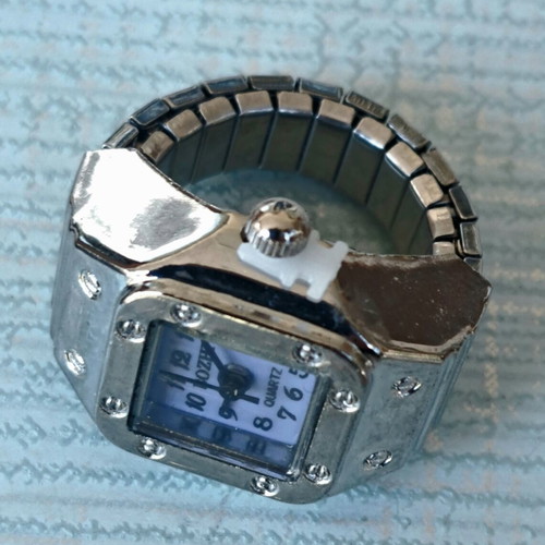 Ring watch quartz with purple dial and silver bracelet like new