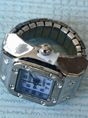 Ring watch quartz with purple dial and silver bracelet like new
