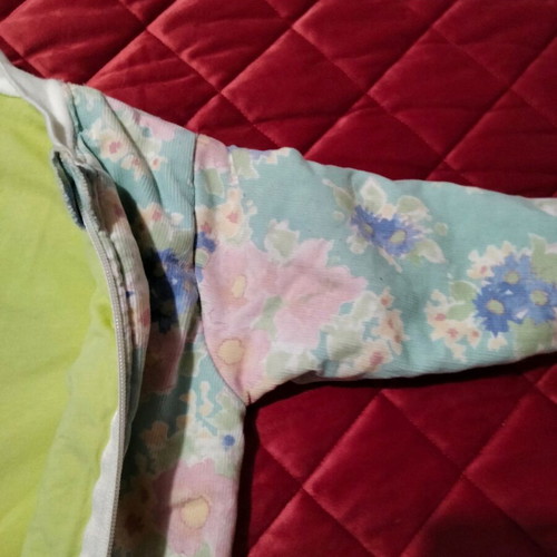 Baby sleeping bag or full-body romper with zipper and floral pattern like new