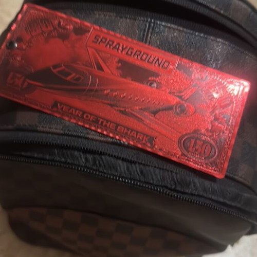 Sprayground backpack like new, brown and black