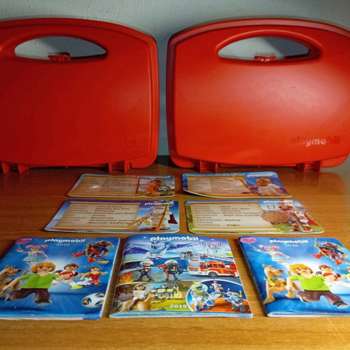 Playmobil cases used with cards and brochures