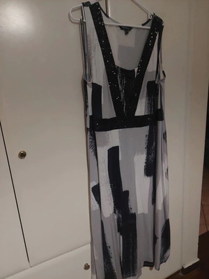 Long dress with sequins used, black and grey abstract pattern