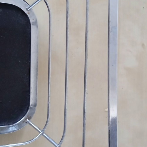 Metal fruit bowl with wooden base used