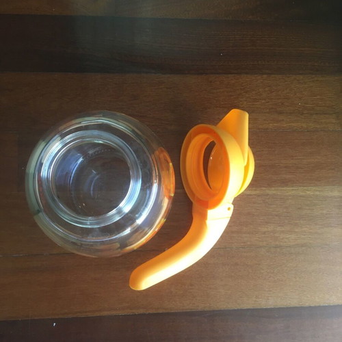 Solmazer jug like new with orange pattern and plastic lid