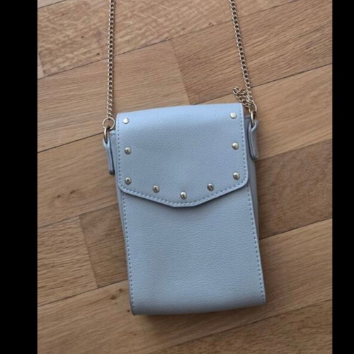 Small blue crossbody bag with chain and studs