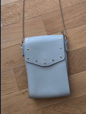 Small blue crossbody bag with chain and studs