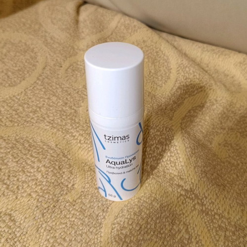 Empty face cream packaging 55g used