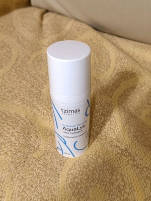 Empty face cream packaging 55g used