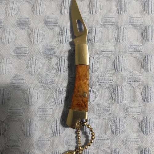 Pocket knife like new, silver and brown, 7 cm