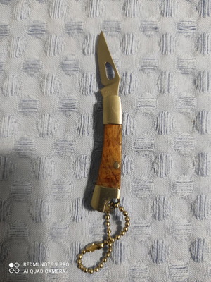 Pocket knife like new, silver and brown, 7 cm