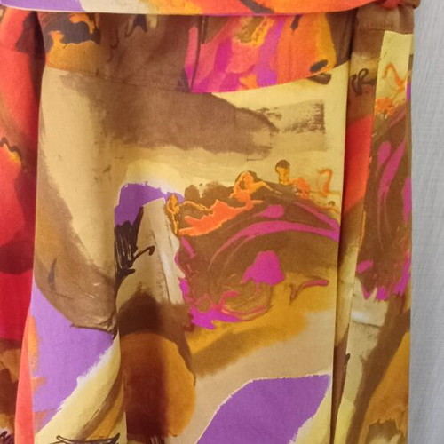 Evening strapless dress with belt in warm shades