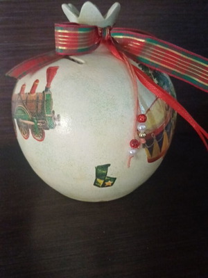 Handmade ceramic piggy bank decoupage with festive motif