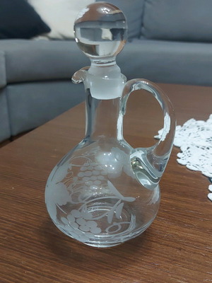 Vintage carafe with embossed design like new