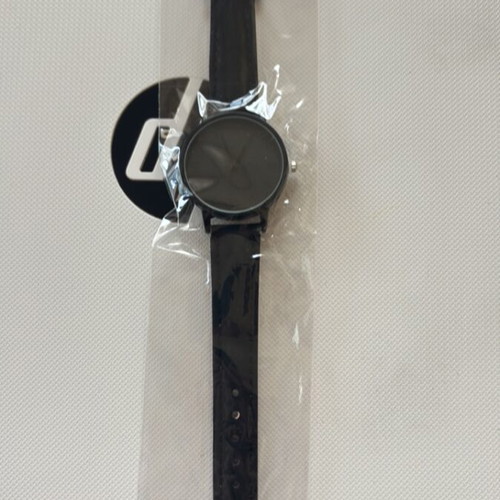 Wristwatch new, black with Latin numerals and synthetic leather strap
