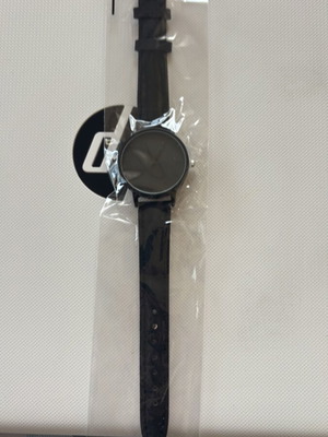 Wristwatch new, black with Latin numerals and synthetic leather strap