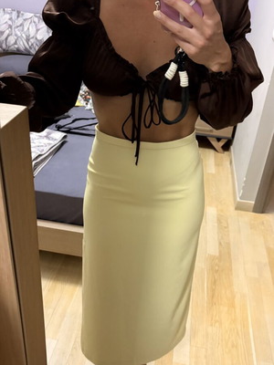 H&M yellow skirt XS with back zipper and side slit, new