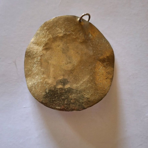 Pendant for necklace used with brown marks