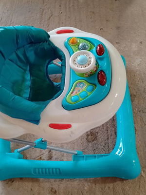 Premaman walker used, blue with adjustable seat height and toys
