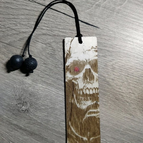 Handmade wooden bookmark with skull design and lava stone beads