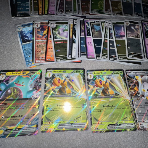 Pokemon bulk cards set with 125 non-foil and 58 foil cards