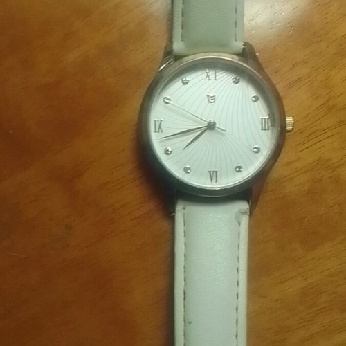 Wristwatch women's new with white strap and quartz mechanism