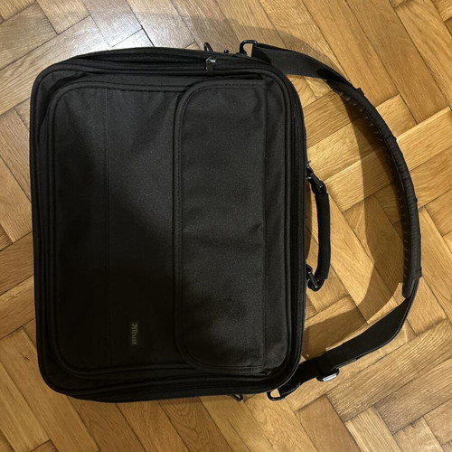 Black laptop bag with shoulder strap and pockets