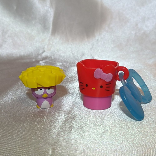 Hello Kitty & Badtz-Maru stamp with fries design, purple
